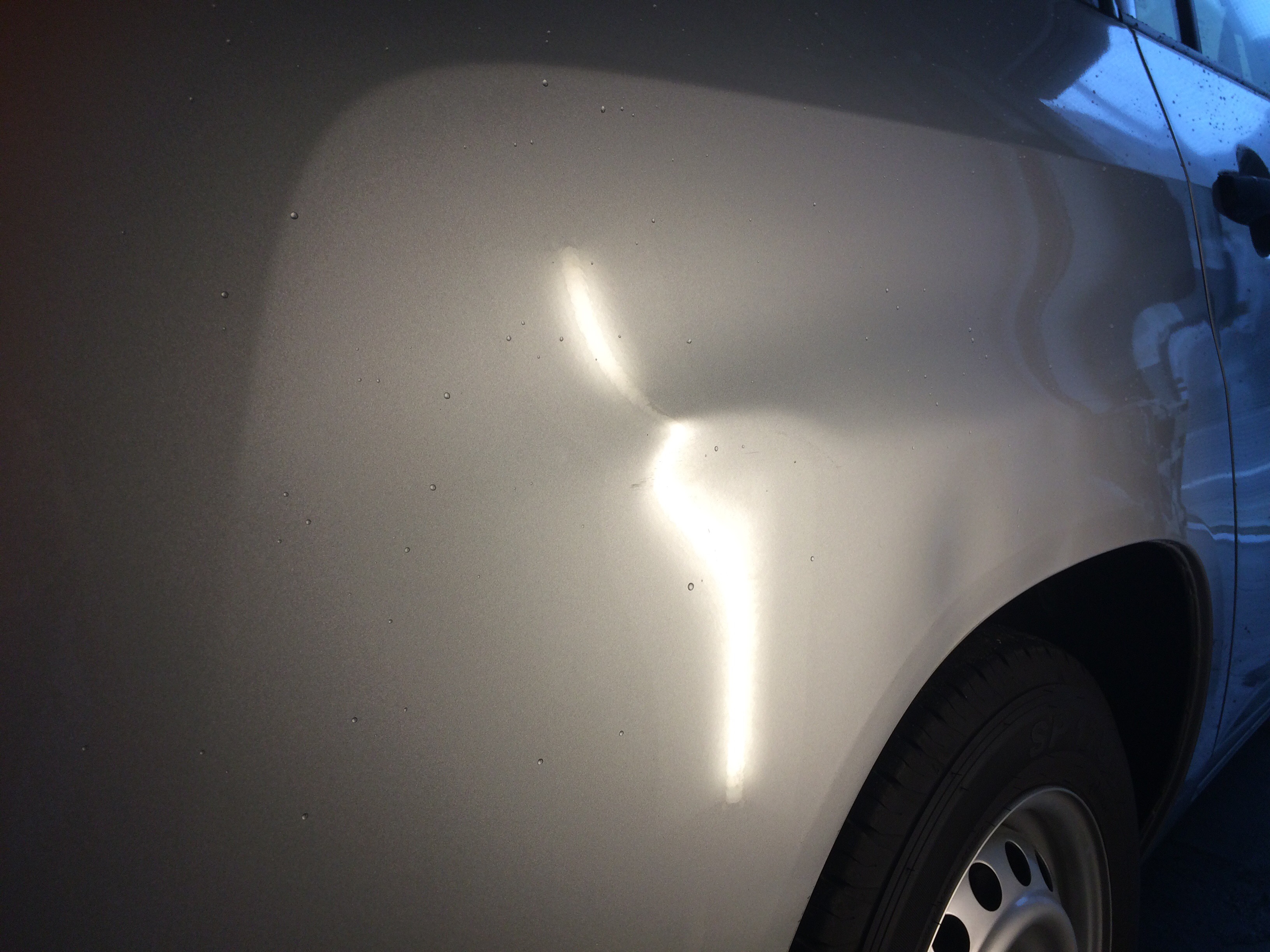 クォーターパネルの凹み修理