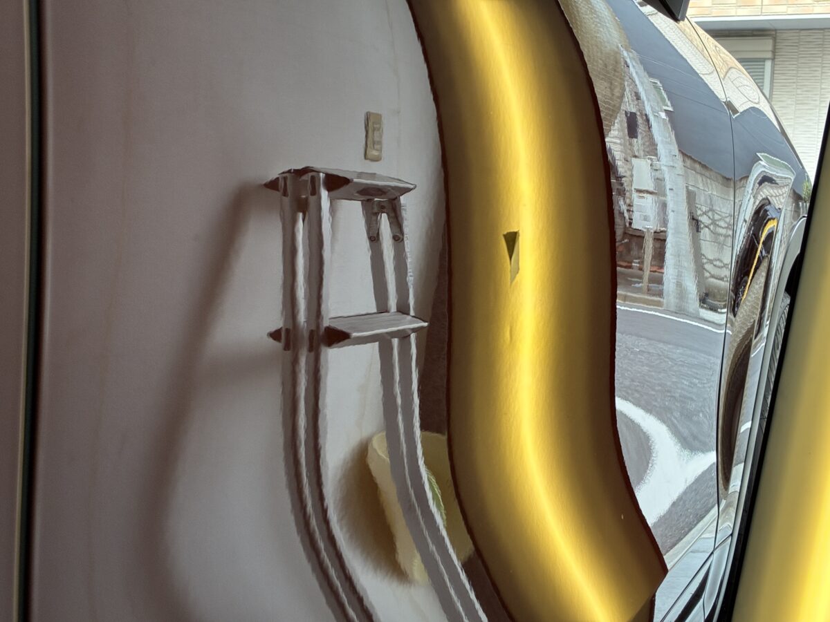 ポルシェカイエン　ドアの小さなヘコミをデントリペア